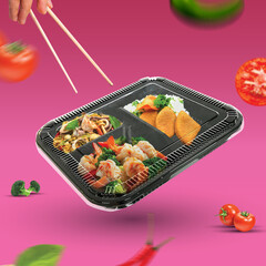 Picture of food in a black plastic tray with 3 compartments
It is placed in a pink background and contains various vegetable elements.
There are both red and green vegetables, very delicious to eat.