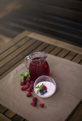 dessert against a carafe of lemonade on a summer table outside
