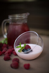 dessert against a carafe of lemonade on a summer table outside
