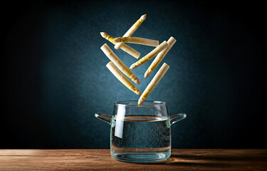 Floating White Asparagus in a glass pot