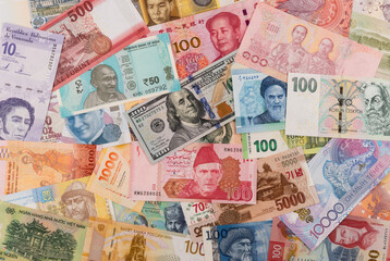Many banknotes from different countries of the world of different denominations
