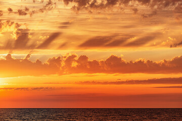 Amazing sunset sky above the sea.