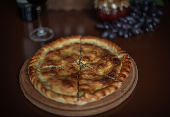 the table in the restaurant is set with Georgian dishes