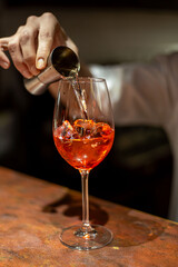 the process of preparing alcoholic beverages at the bar