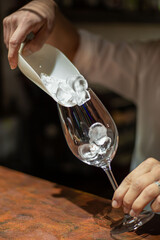 the process of preparing alcoholic beverages at the bar