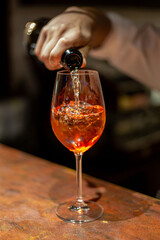 the process of preparing alcoholic beverages at the bar