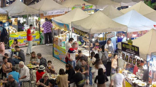 night time illumination chiang mai city famous food crowded market rooftop panorama 4k timelapse thailand 
