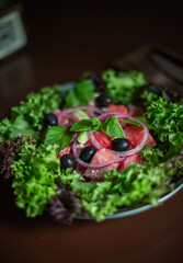 platter of salad on a restaurant table