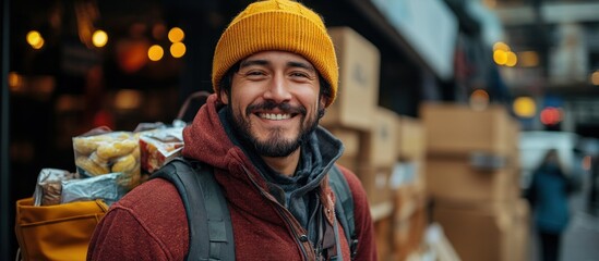 Obraz premium Smiling Man in a Yellow Hat