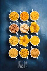 Various pasta in ceramic bowls. Cooking concept.