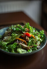 platter of salad on a restaurant table