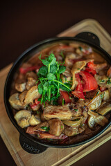 a hot skillet dish on a restaurant table