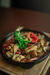 a hot skillet dish on a restaurant table