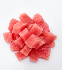 Close up of tuna cubes ingredient isolated on white background