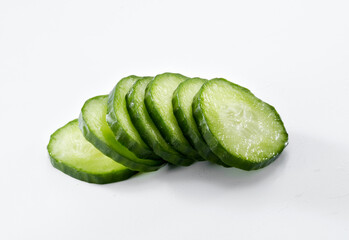 Closeup of cucumber slices isolated on white background