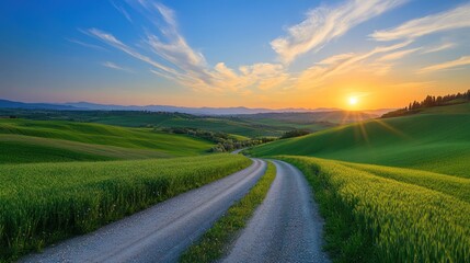 Fototapeta premium Sunset over Tuscan Countryside: Rolling Hills, Serene Road