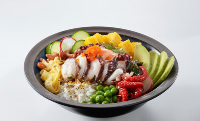 Delicious seafood poke rice isolated on white background