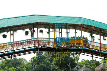Man-made river under with beautiful bridge over it, white sky
