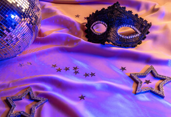 New Year banner. Festive night party with disco ball on bright neon background. Celebration...