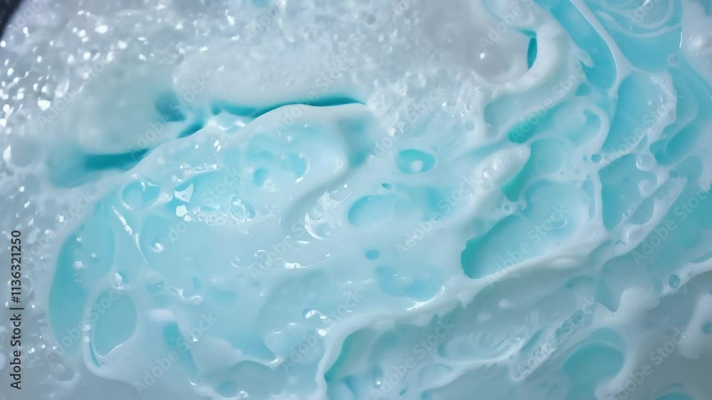 Poster this video performs a 360-degree view to reveal a bubbly soap foam texture featuring white and light