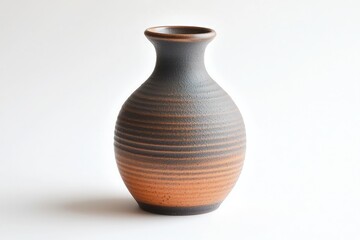 A handcrafted ceramic vase with textured patterns and earthy tones.