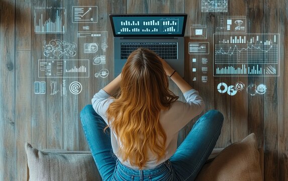 Teenage girl in casual jeans, focused on digital marketing tasks on her laptop, surrounded by tech gadgets, charts, and digital media content