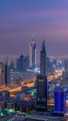 aerial cityscape at dusk tall buildings and lights illuminating the streets below in riyadh city