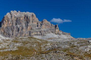 Autumn mountains. Alps in autumn colors. Dolomites beautiful yellow tree leaves autumn landscape. Alpine scenery of golden autumn
