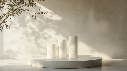 Minimalist composition of three white cylinders on a smooth round platform, illuminated by gentle natural light and subtle shadows.