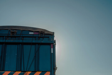 In the vastness of the road, the truck follows its course, guided by the truck driver's heart,...