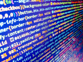 Programming code on monitor screen. Smile its fridaydigits on the screen. Online data security concept. Programming code abstract screen of software developer. Programming concept. Blue color.