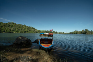 Naklejka premium Patenggang Lake Bandung, with Traditional boat on the Foreground