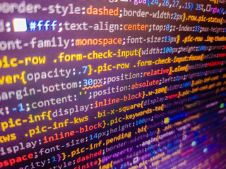Backend code can be used as background. Sequence of numbers with bright colors on a black background. Software computer programming code and circuit board abstract technology background.