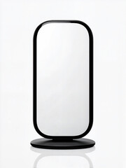 Sleek freestanding mirror with a minimalist black frame enhances modern interior design elements