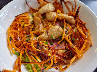 Stir Fried taro noodles with chicken closeup image 