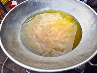 A hot oil in a lage pan