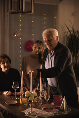 Grandparents Celebrating Birthday With Granddaughter