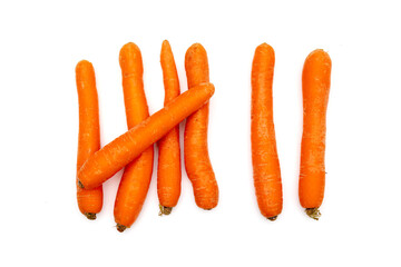 Counting Exercise with Seven Carrots on a White Background