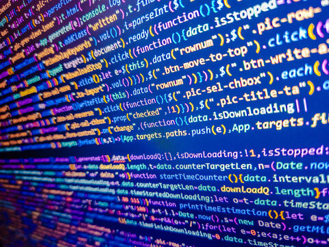 Programming code on computer screen. Green binary code on computer screen texture background. Abstract computer script code. Programming concept. Background of program code. Web dewelopment.