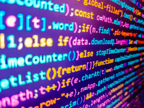Colorful digital technology modern background. Online data security concept. Closeup of minified javascript file. Software development monitor screen background. Virus in program code.