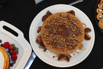 Peanut Butter Chocolate Cheesecake with Candy Topping