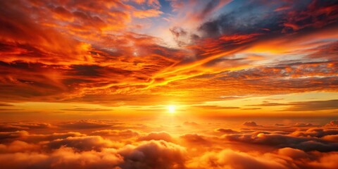 Fototapeta premium Fiery Sunset Above a Sea of Clouds A Stunning Aerial View of Nature's Golden Hour