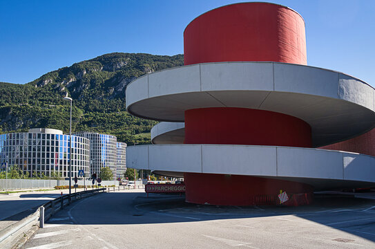 Modern architecture ramp with a red tower in the center