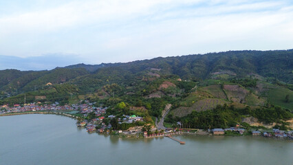 Fototapeta premium Aerial view of the village in the middle of the lake.
