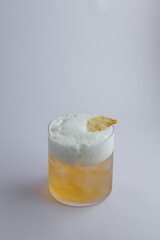 This is a closeup view of a refreshing drink placed in a glass on a table