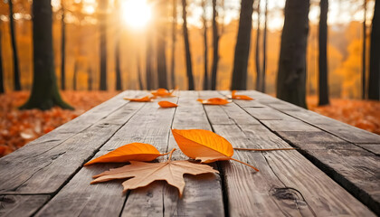 Autumn Background with Wooden Table in Park Featuring Falling Leaves, Colorful Bokeh, and Warm Sunset Lighting