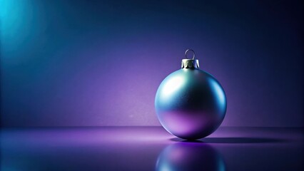 Fototapeta premium Single iridescent bauble on reflective surface with vibrant purple and blue lighting