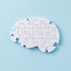 White Puzzle Brain Concept on Blue Background, Symbolizing Problem Solving, Intelligence, and Alzheimer's Awareness