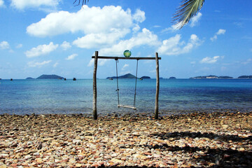 Bai Soi Beach belongs to the Nam Du archipelago with a wooden swing on the beach