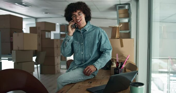 Happy man, phone call or laptop with boxes for stock management, distribution or inventory at warehouse. Male person, distributor or talking on mobile smartphone for online shipping, order or service